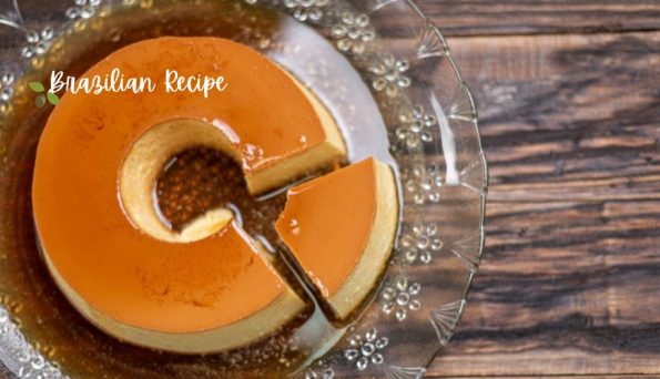 Caramel flan in a glass dish with a slice removed, overlaid with 'Brazilian Recipe' text on the top-left.