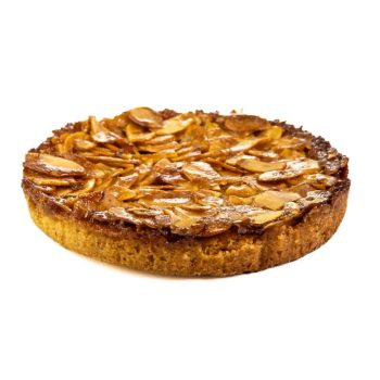 Almond tart topped with toasted almond slices on a golden crust against a white background.