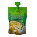 Ipanema Creme com Queijo Catupiry-style cheese spread in a green pouch, shown with bread and cheese dip on a plate.