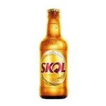 Bottle of Skol lager with condensation on a white background.