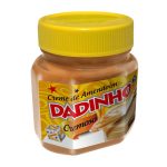 Jar of creamy peanut butter with a bright yellow lid and a bold red 'DADINHO' label on the lid.