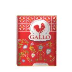 Red decorative tin can of Gallo Portuguese olive oil with a white circular rooster logo and colorful floral motifs on a red background, packaging artfully displayed.