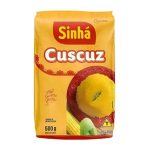 Sinha Cuscuz corn flour package in bright yellow with red logo and a plate of molded yellow cuscuz on a red dish