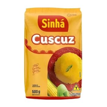 Sinha Cuscuz corn flour package in bright yellow with red logo and a plate of molded yellow cuscuz on a red dish