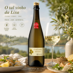 Bottle of O tal vinho da Lixa Vinho Verde with a glass of white wine on a sunlit outdoor table; label and seal visible.